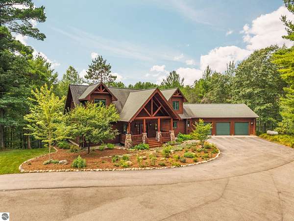 10 Acres of Recreational Land with Home for Sale in Williamsburg, Michigan