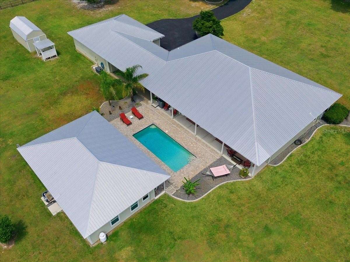 2.5 Acres of Land with Home for Sale in De Leon Springs, Florida