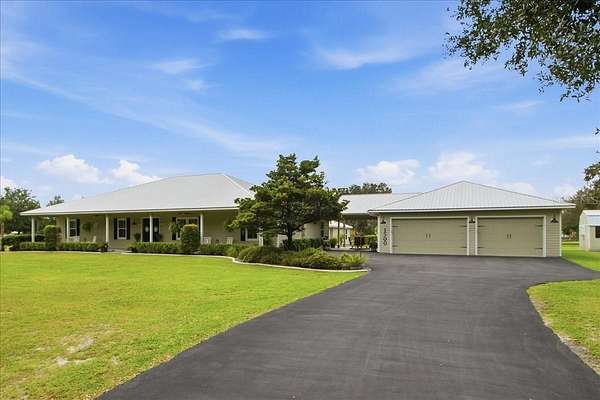 2.5 Acres of Land with Home for Sale in De Leon Springs, Florida