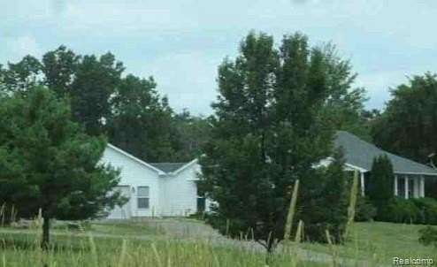 13.1 Acres of Land with Home for Auction in Stockbridge Township, Michigan