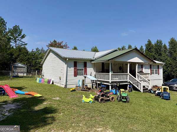 15.4 Acres of Land with Home for Sale in East Dublin, Georgia