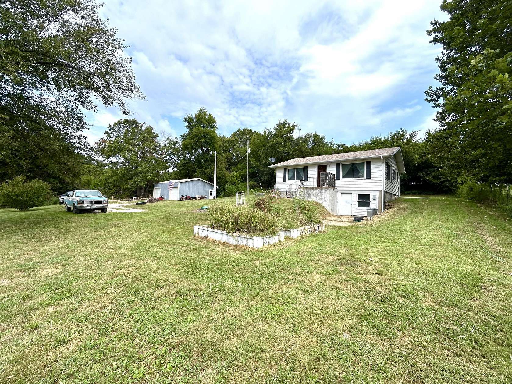 4.47 Acres of Land with Home for Sale in Mansfield, Missouri