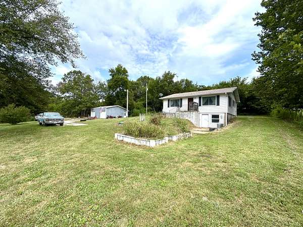4.47 Acres of Land with Home for Sale in Mansfield, Missouri