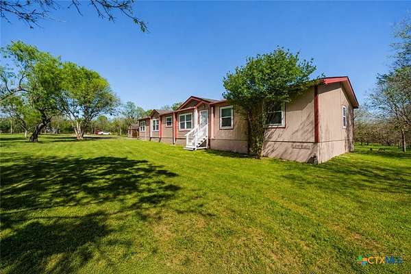 10 Acres of Land with Home for Sale in Red Rock, Texas