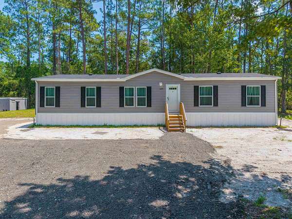 2.38 Acres of Land with Home for Sale in Palatka, Florida