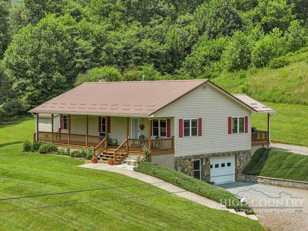 6.8 Acres of Land with Home for Sale in Vilas, North Carolina