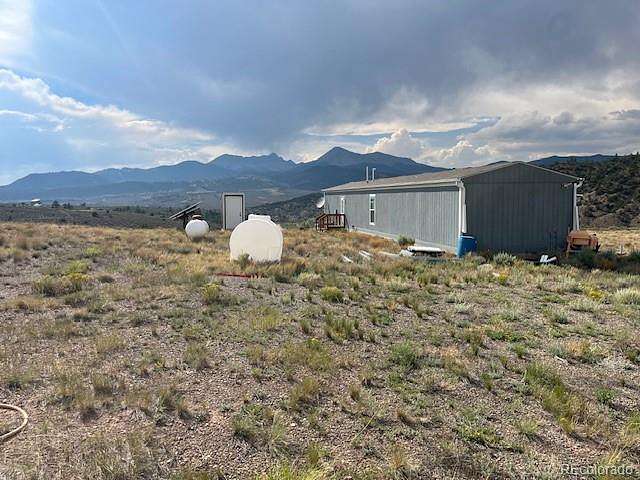 6.54 Acres of Land with Home for Sale in Fort Garland, Colorado