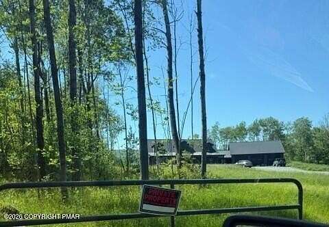 5.66 Acres of Land with Home for Auction in Waymart, Pennsylvania