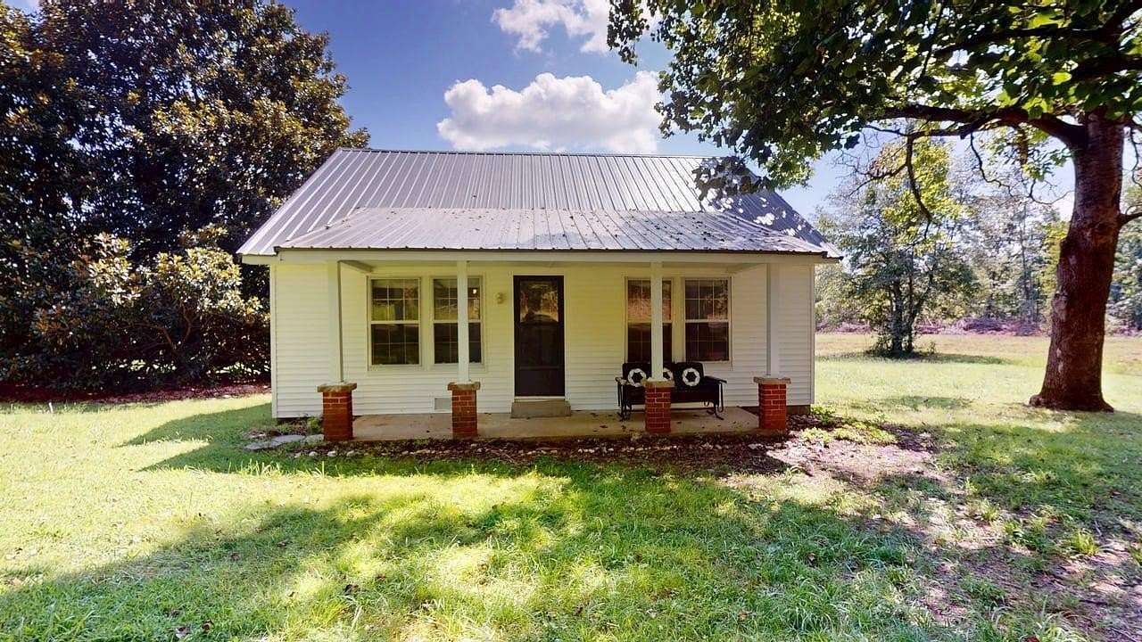 83 Acres of Recreational Land with Home for Sale in Grand Rivers, Kentucky