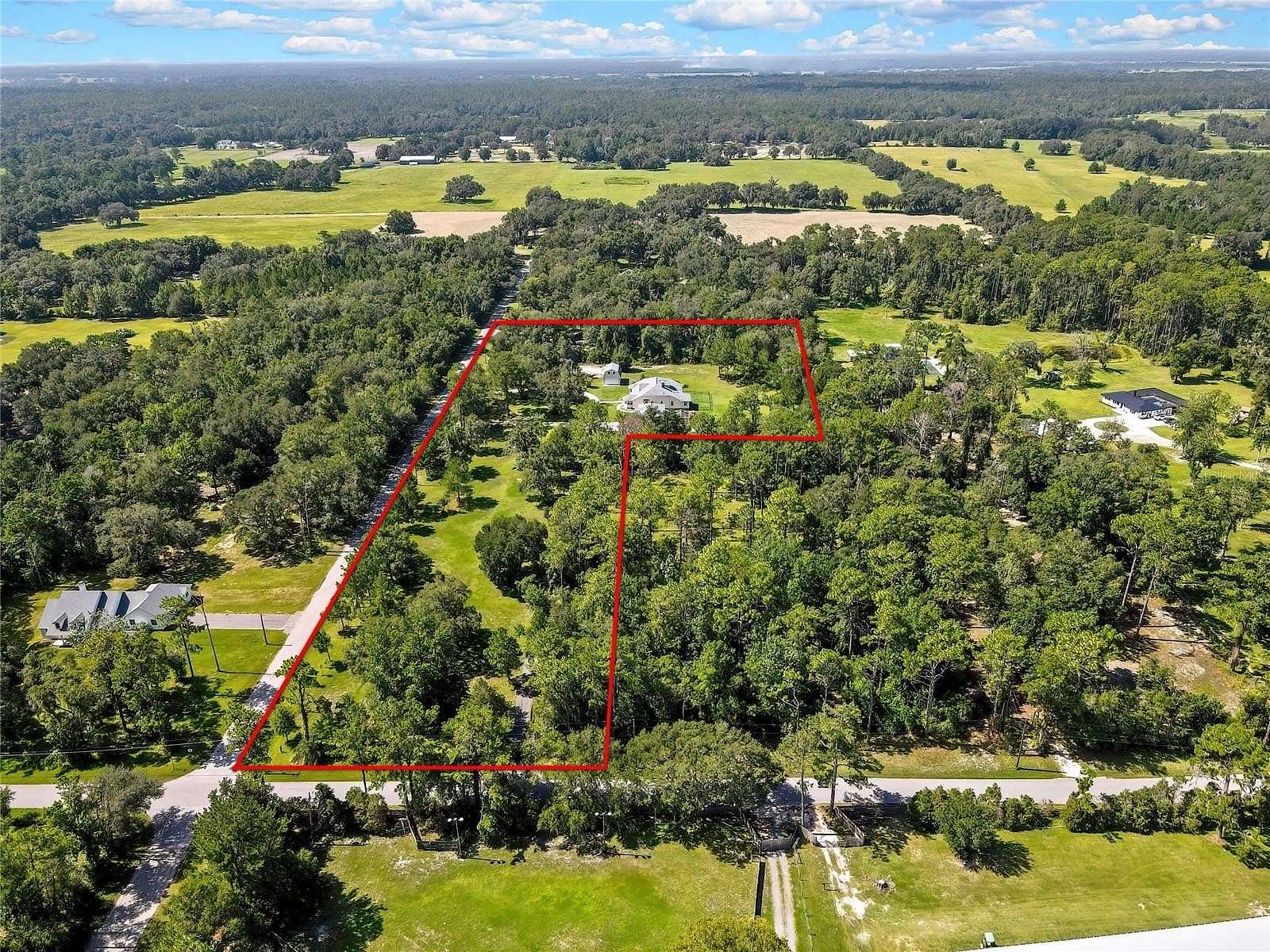 4.7 Acres of Land with Home for Sale in Brooksville, Florida