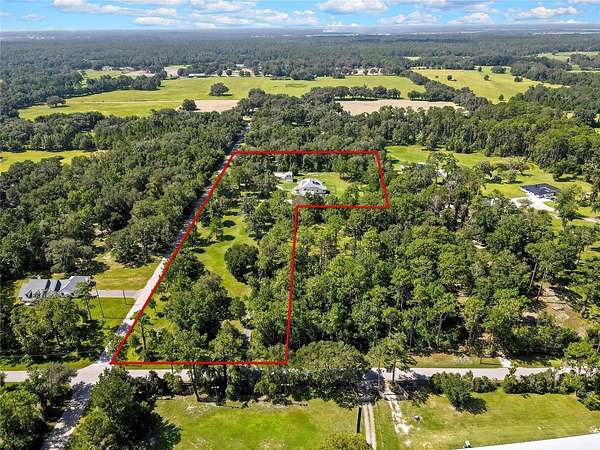 4.7 Acres of Land with Home for Sale in Brooksville, Florida