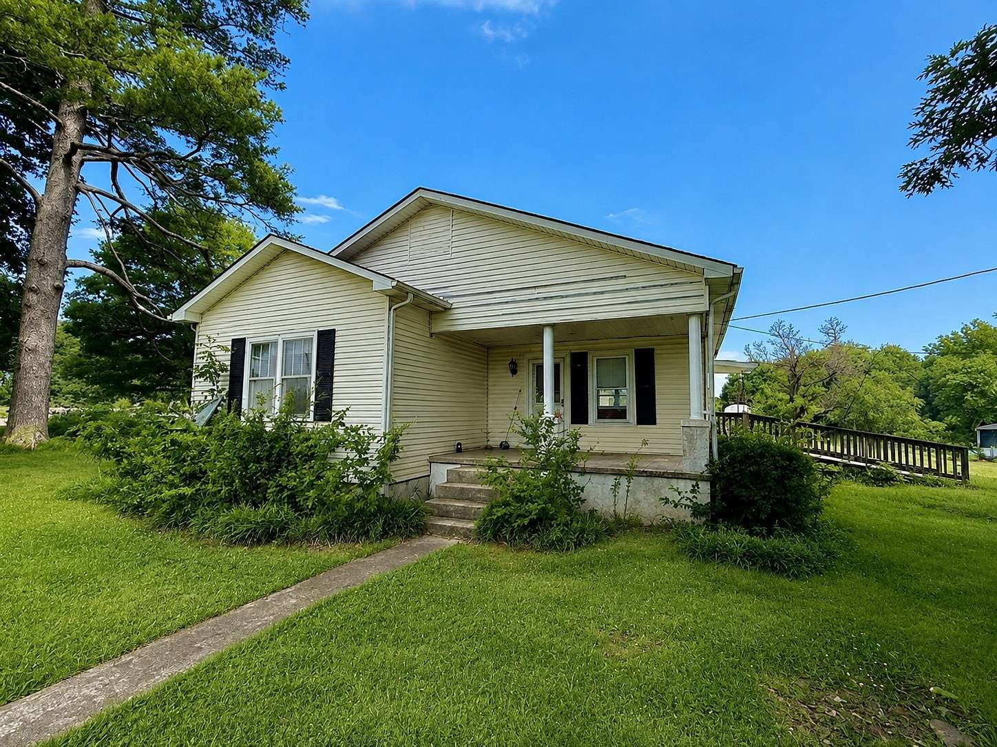 1.5 Acres of Land with Home for Sale in Loretto, Tennessee