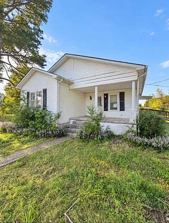 1.5 Acres of Land with Home for Sale in Loretto, Tennessee