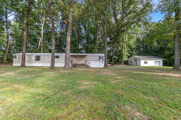 3.67 Acres of Land with Home for Sale in Oldfort, Tennessee