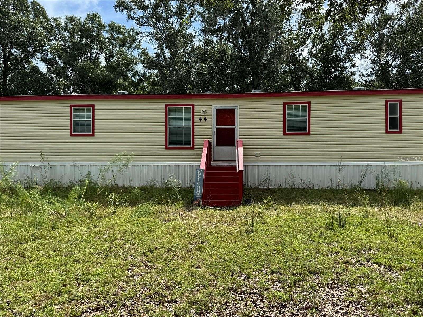 2.5 Acres of Land with Home for Sale in Frostproof, Florida