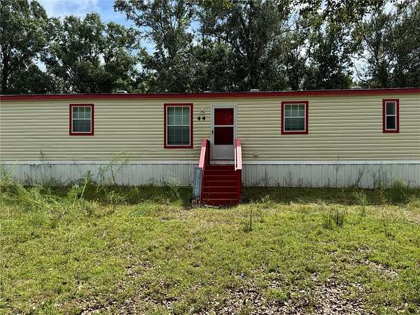 2.5 Acres of Land with Home for Sale in Frostproof, Florida
