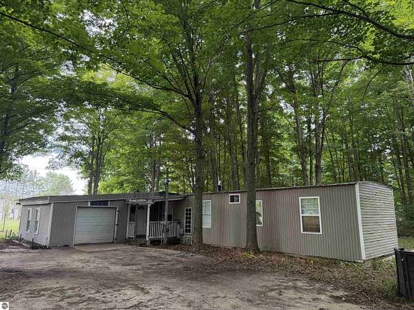 5 Acres of Land with Home for Sale in Beulah, Michigan