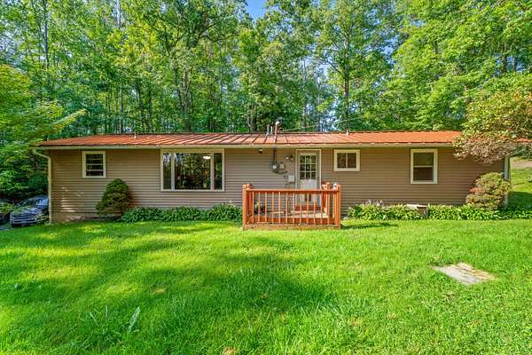 3 Acres of Land with Home for Sale in Ossineke, Michigan