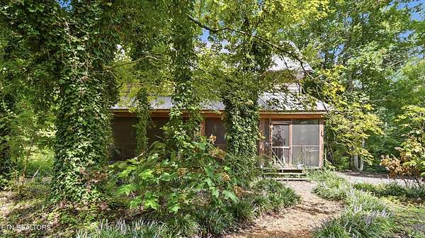 2.8 Acres of Land with Home for Sale in Oldfort, Tennessee