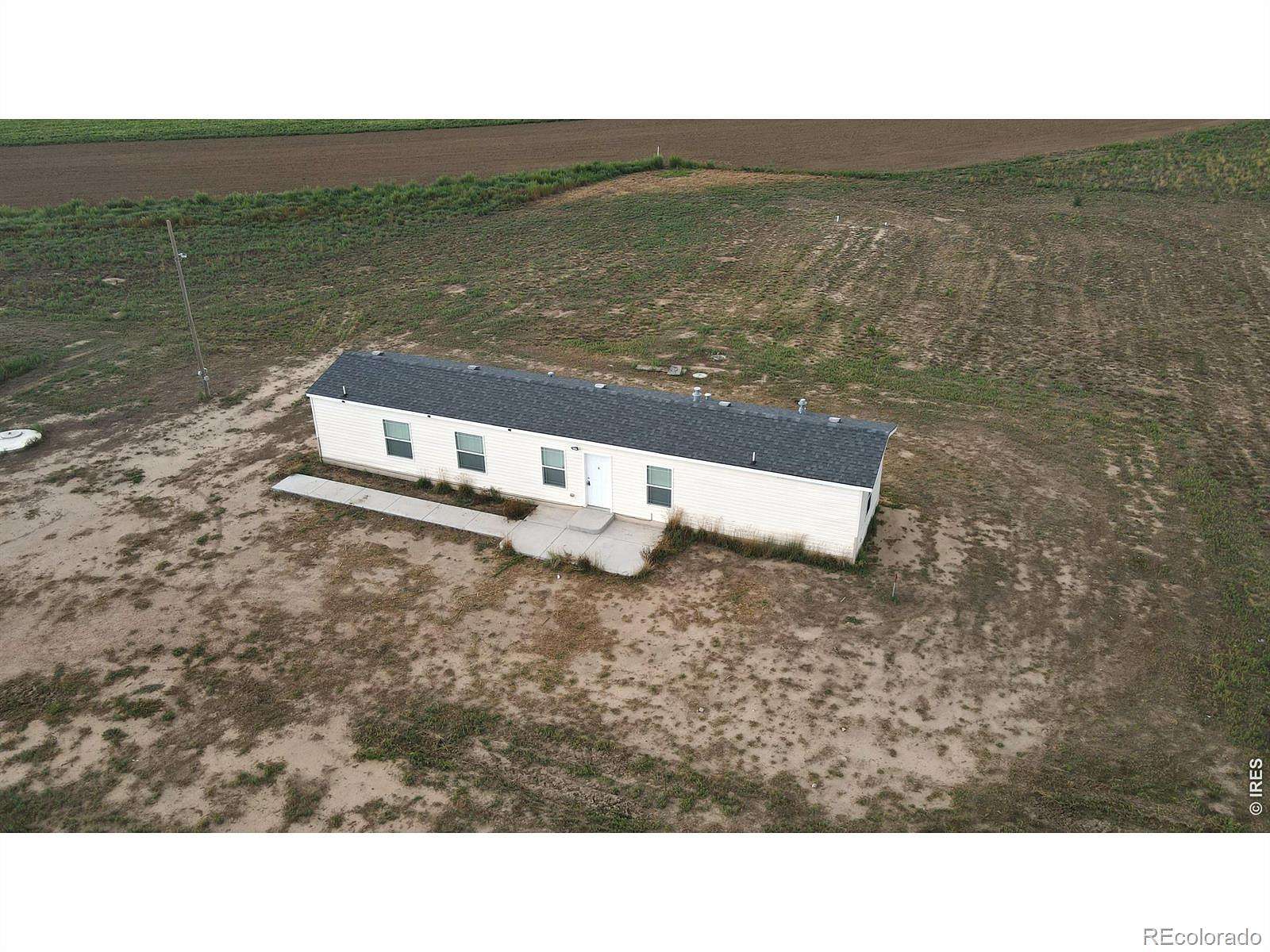 4.46 Acres of Land with Home for Sale in Wiggins, Colorado