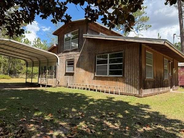 4.68 Acres of Land with Home for Sale in Bell, Florida