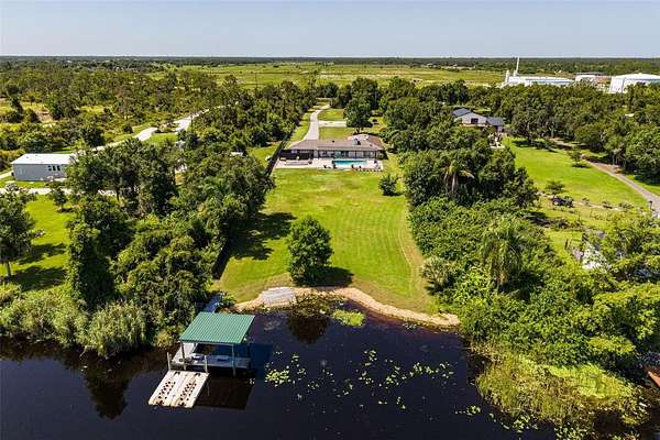 2.35 Acres of Land with Home for Sale in Punta Gorda, Florida
