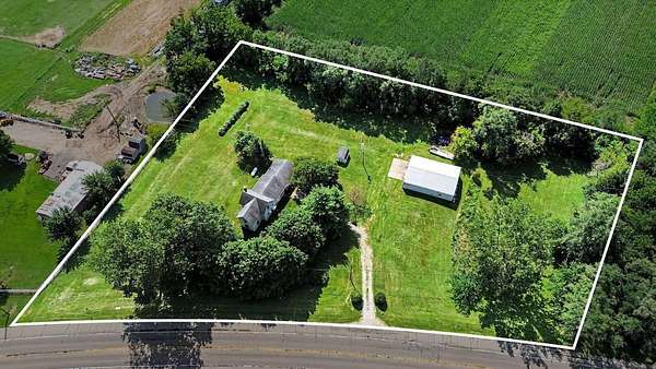 2.5 Acres of Land with Home for Auction in Edwardsburg, Michigan