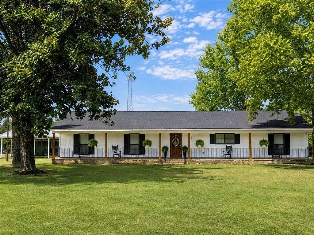 9.9 Acres of Land with Home for Sale in Chunchula, Alabama