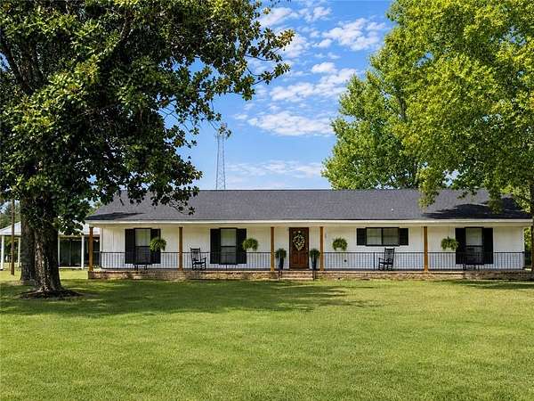 9.9 Acres of Land with Home for Sale in Chunchula, Alabama
