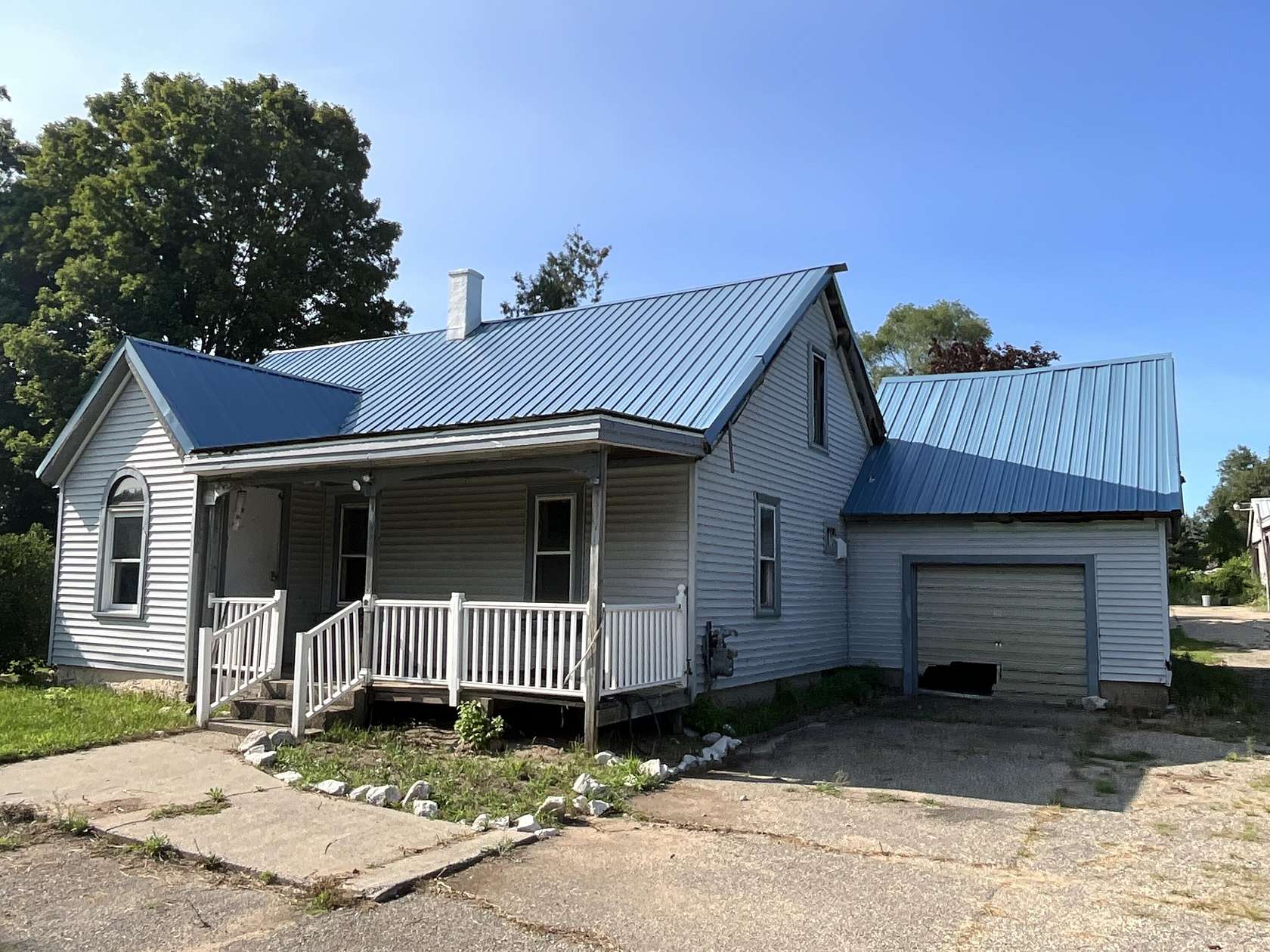 2.4 Acres of Land with Home for Auction in Comstock Park, Michigan