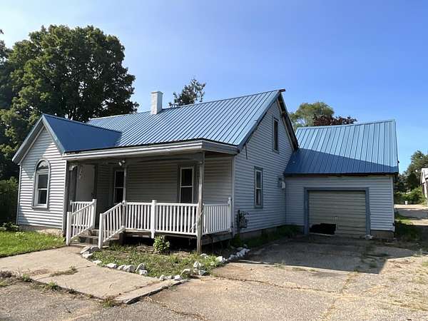 2.4 Acres of Land with Home for Auction in Comstock Park, Michigan