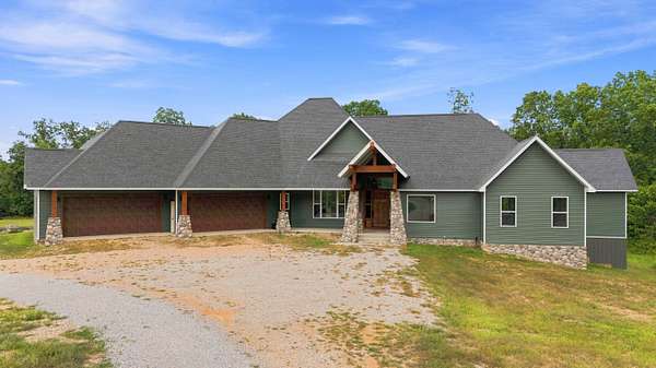 36.4 Acres of Recreational Land with Home for Sale in Pomona, Missouri