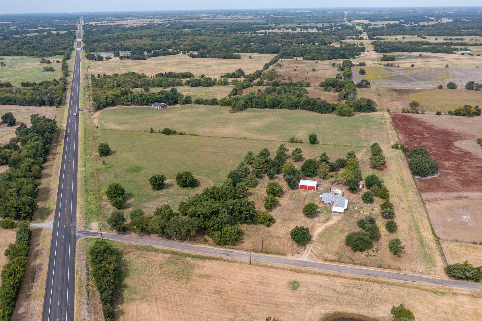 12.6 Acres of Land with Home for Sale in Commerce, Texas