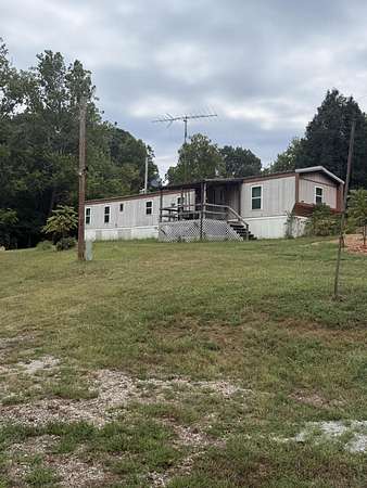 15 Acres of Recreational Land with Home for Sale in Goodman, Missouri