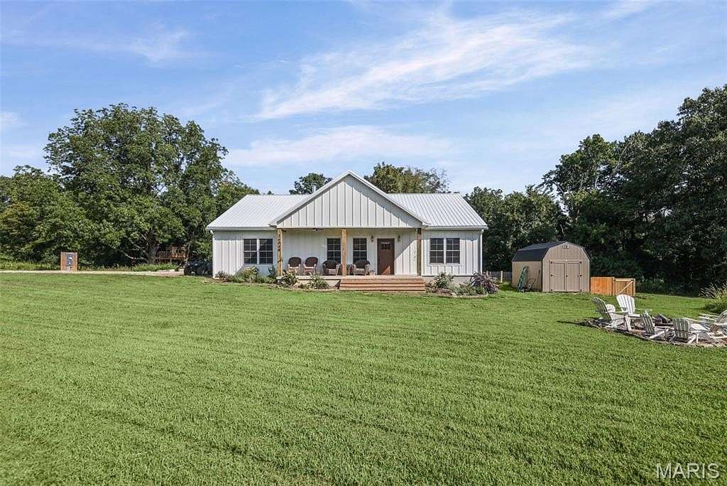 12.8 Acres of Land with Home for Sale in Dow, Illinois