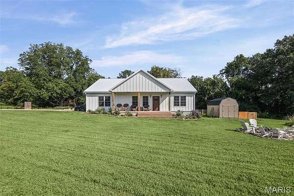 12.8 Acres of Land with Home for Sale in Dow, Illinois
