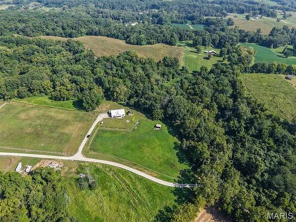 12.8 Acres of Land with Home for Sale in Dow, Illinois