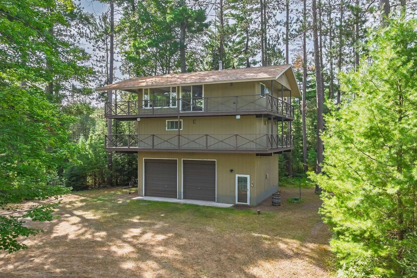 11.4 Acres of Recreational Land with Home for Sale in Minocqua, Wisconsin