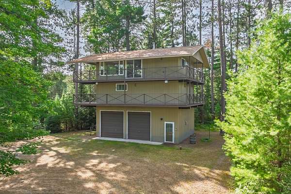 11.4 Acres of Recreational Land with Home for Sale in Minocqua, Wisconsin