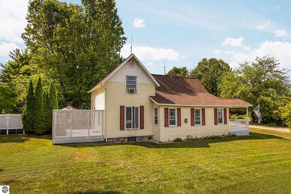 5 Acres of Land with Home for Sale in Kingsley, Michigan