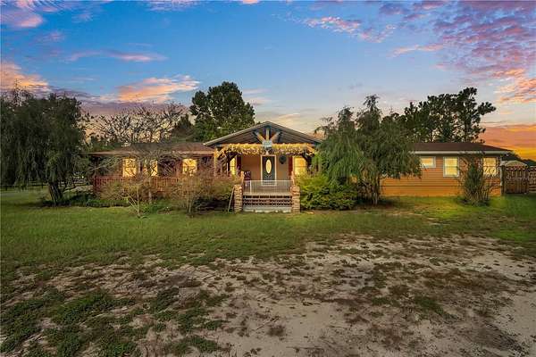 2.44 Acres of Land with Home for Sale in Zephyrhills, Florida