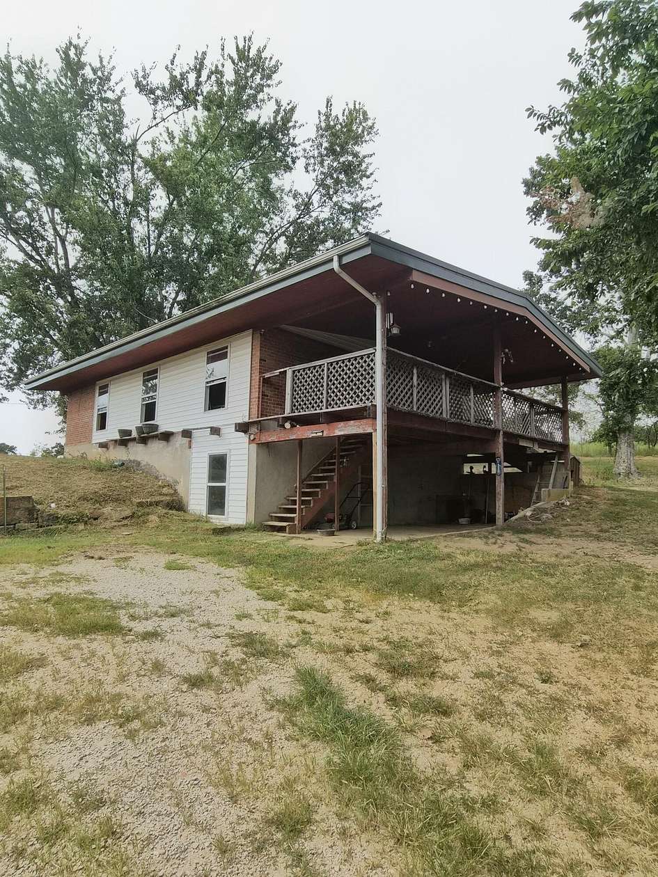 4.77 Acres of Land with Home for Sale in Mansfield, Missouri