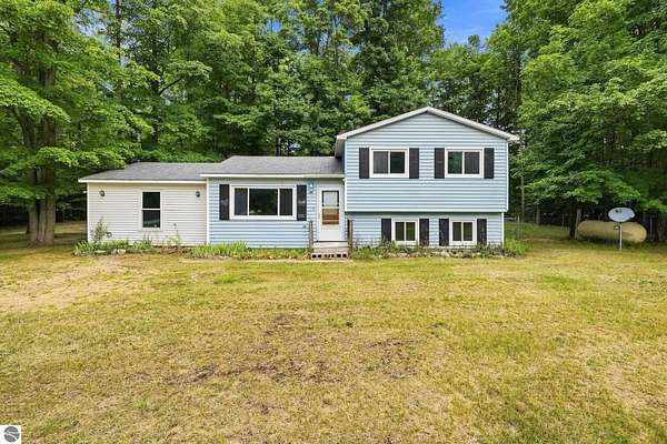 2.5 Acres of Land with Home for Sale in Kingsley, Michigan