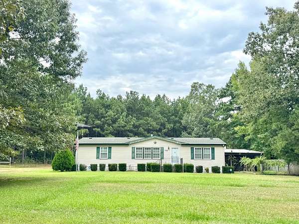 7.38 Acres of Land with Home for Sale in Marietta, Texas