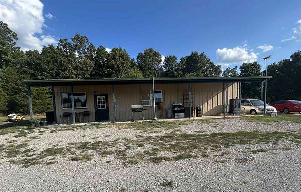 10 Acres of Land with Home for Sale in Camp, Arkansas
