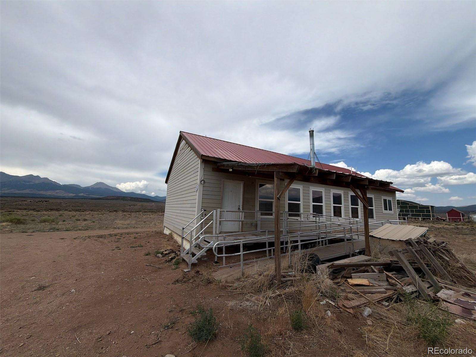 5 Acres of Land with Home for Sale in Fort Garland, Colorado