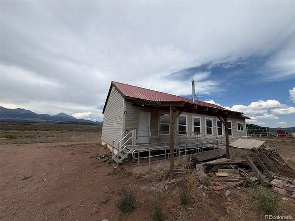 5 Acres of Land with Home for Sale in Fort Garland, Colorado