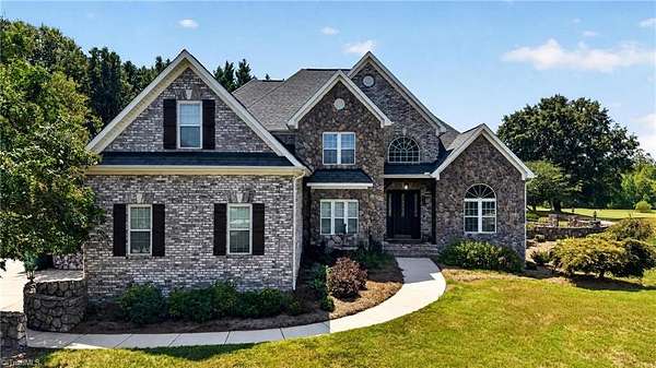 2 Acres of Land with Home for Sale in Summerfield, North Carolina