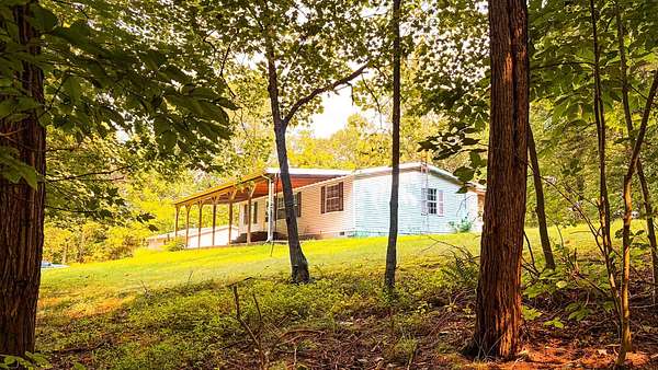 3 Acres of Land with Home for Sale in Logan, Ohio