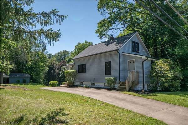 3.88 Acres of Land with Home for Sale in Akron, Ohio